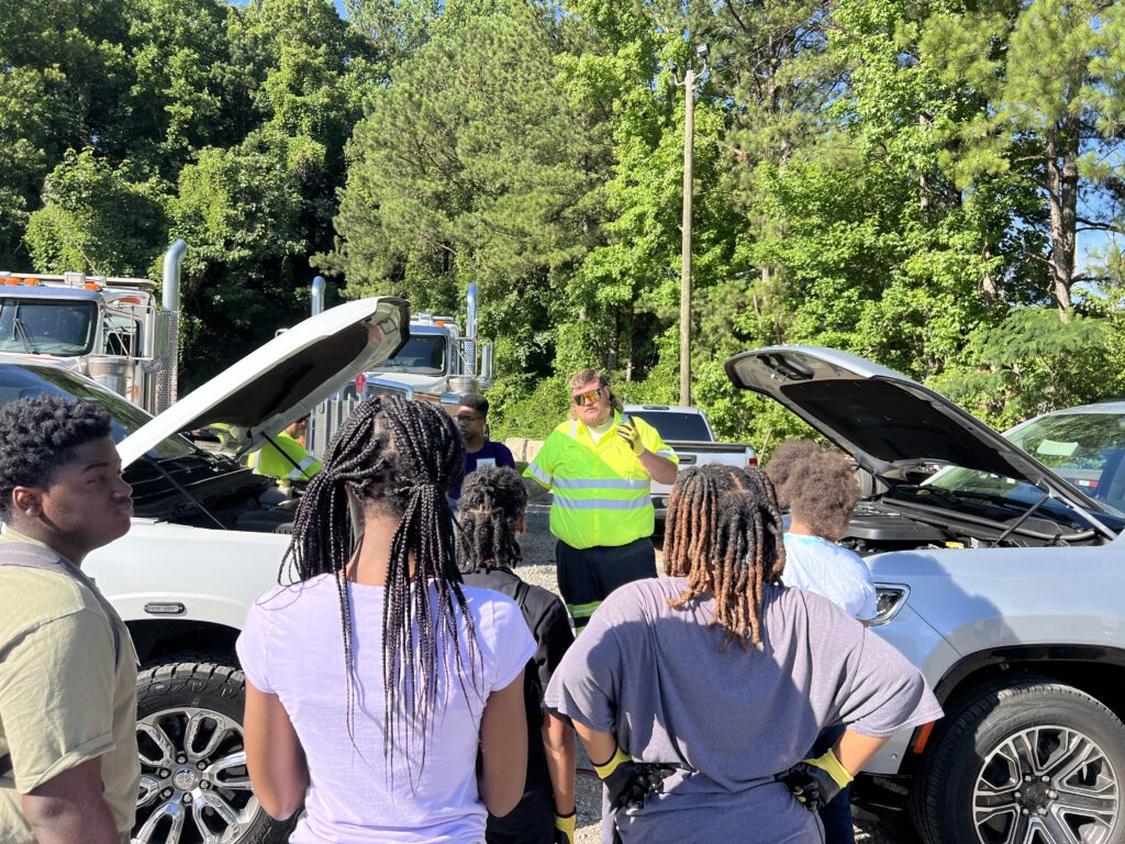 Tow Truck Worker Educating Teens | Marietta Wrecker Service